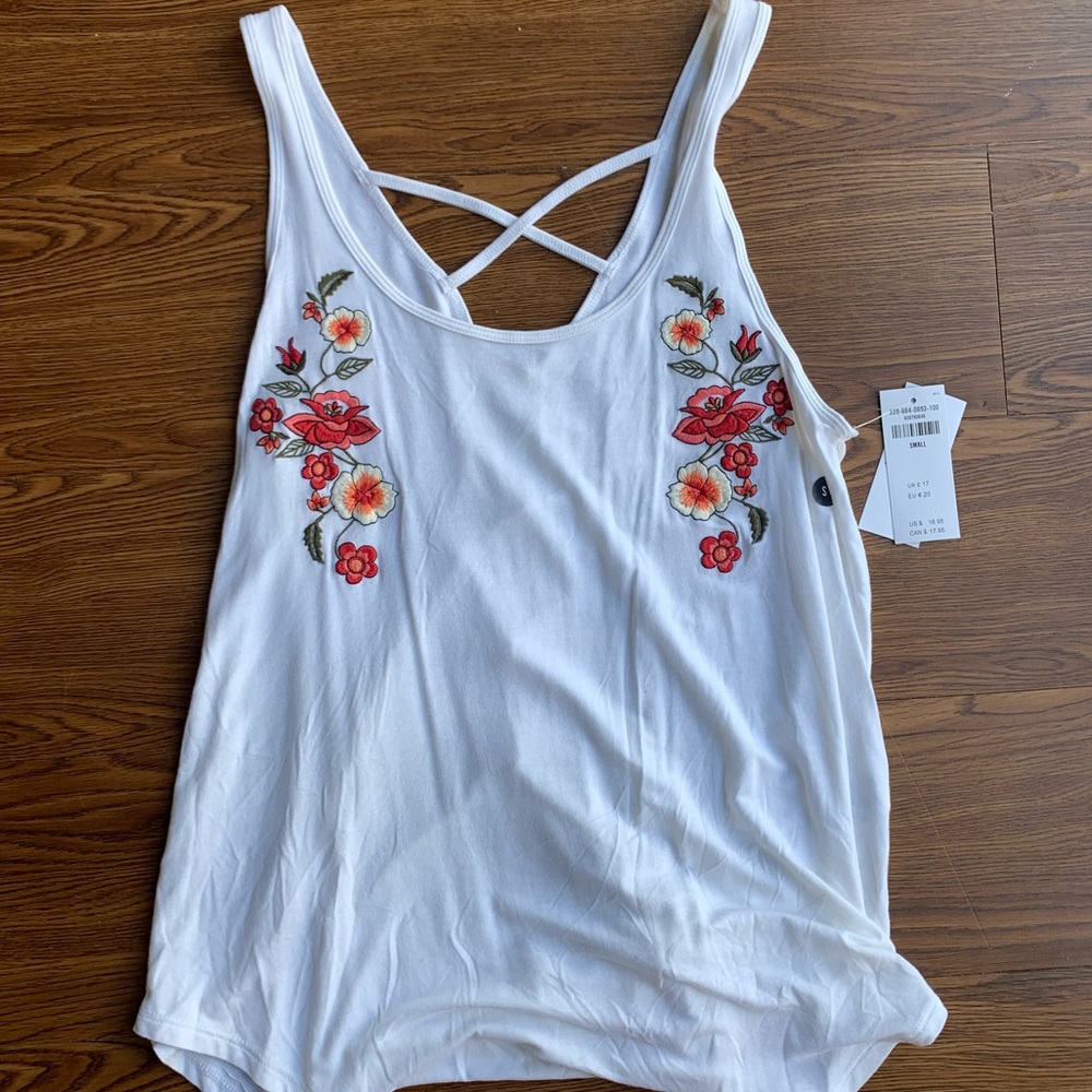white tank with floral design